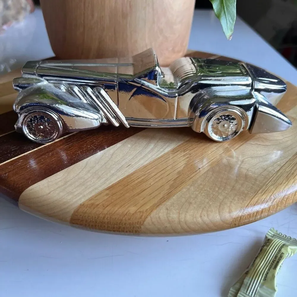 Avon Silver Duesenberg Car Decanter, which was originally marketed for Wild Coun